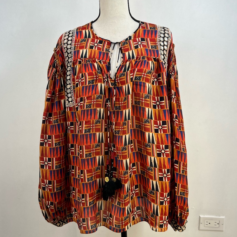 Vibrant Geometric Blouse with Tassel Detail